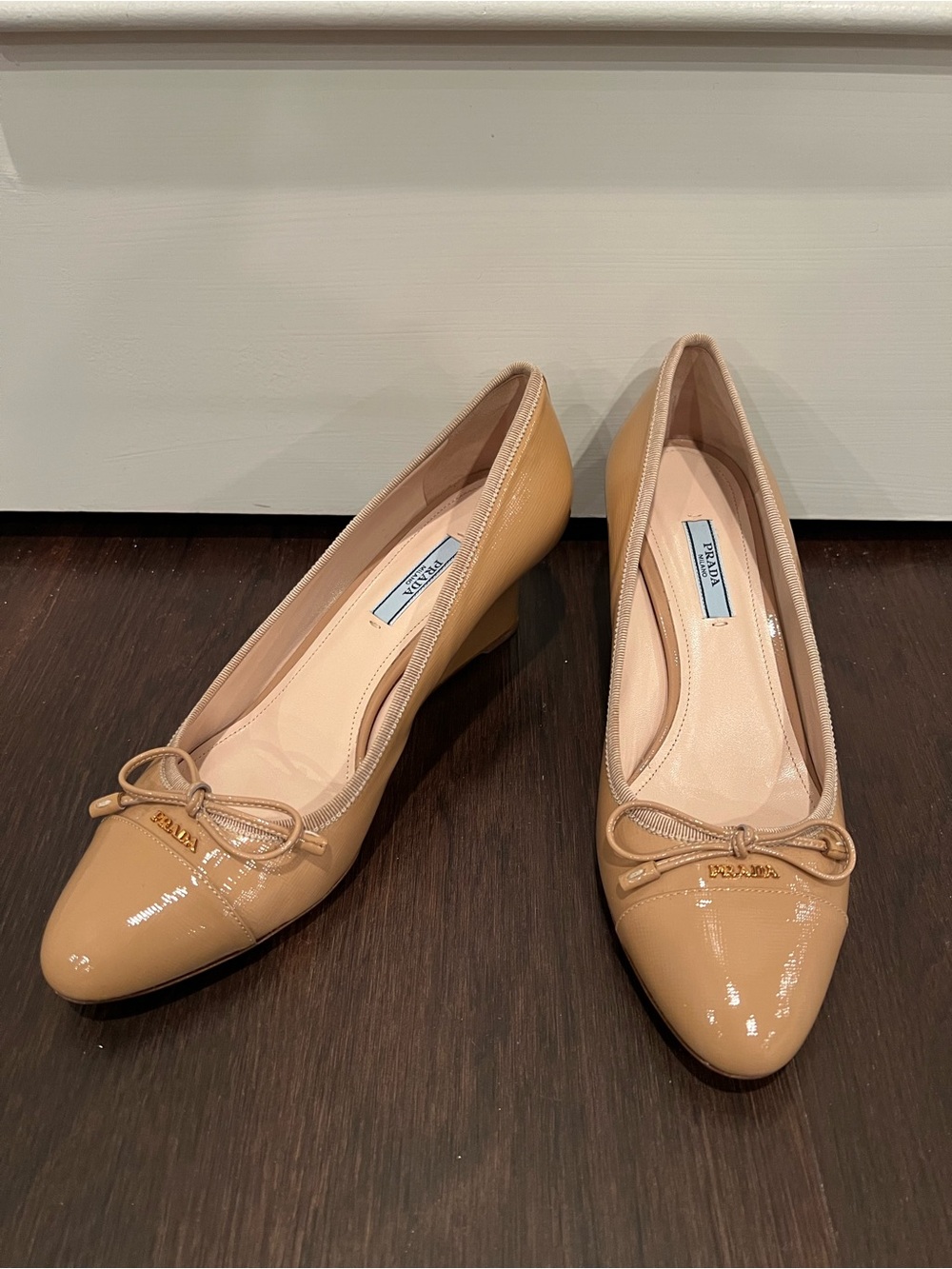 Prada Nude Patent Leather Bow Pumps